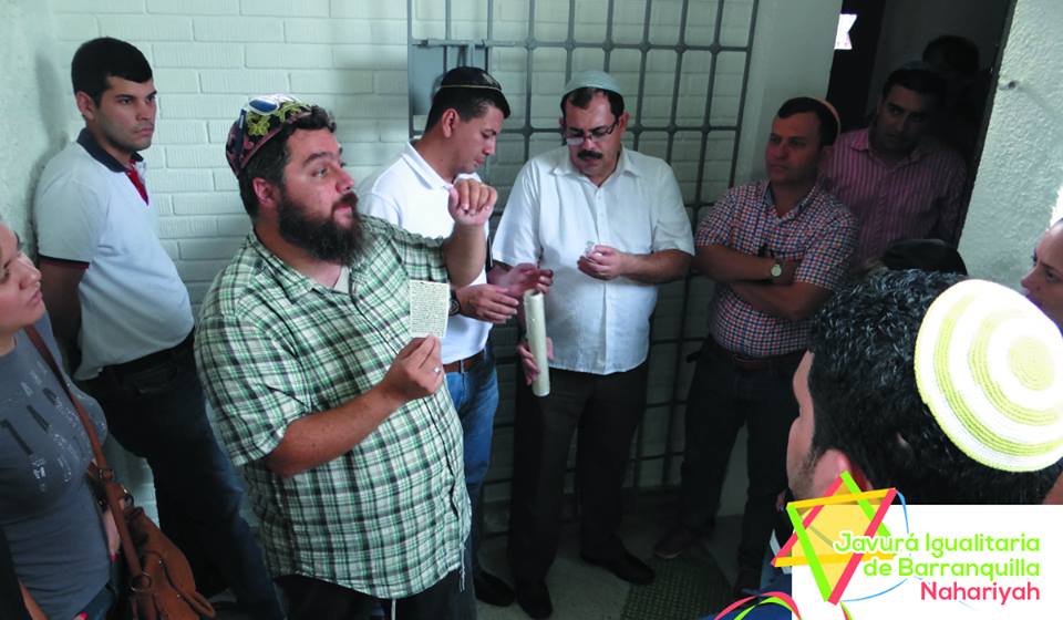 Rabbi Juan Mejia performing the Hanukkah candle lighting with the Barranquilla community. (Courtesy) Rabbi Juan Mejia performing the Hanukkah candle lighting with the Barranquilla community. (Courtesy)