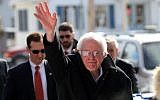 Sen. Bernie Sanders waving in Concord on the day of the Democratic primary in New Hampshire,  February 9, 2016. (Spencer Platt/Getty Images/JTA)