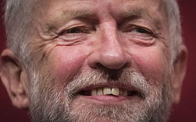 Jeremy Corbyn celebrates his victory following the announcement of the winner in the Labour leadership contest between him and Owen Smith at the ACC Liverpool, England, Sept 24, 2016 (Danny Lawson/PA via AP)