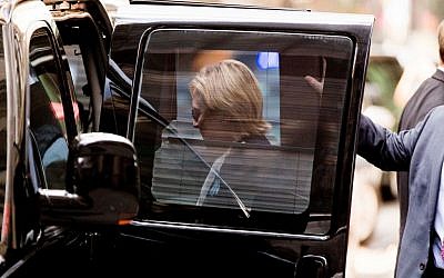 Democratic presidential candidate Hillary Clinton gets into a van as she leaves an apartment building Sunday, Sept. 11, 2016, in New York. Clinton's campaign said the Democratic presidential nominee left the 9/11 anniversary ceremony in New York early after feeling "overheated." (AP Photo/Andrew Harnik) Democratic presidential candidate Hillary Clinton gets into a van as she leaves an apartment building Sunday, Sept. 11, 2016, in New York. Clinton's campaign said the Democratic presidential nominee left the 9/11 anniversary ceremony in New York early after feeling "overheated." (AP Photo/Andrew Harnik)