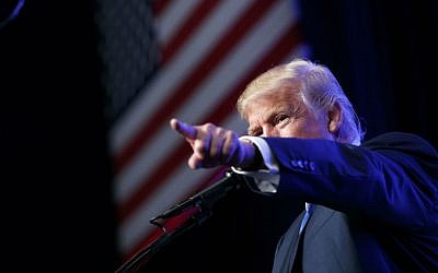 In this Sept. 16, 2016 photo, Republican presidential candidate Donald Trump speaks during a campaign rally at the James L. Knight Center in Miami. (AP Photo/Evan Vucci)