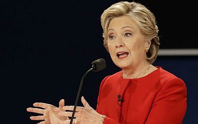 Democratic presidential nominee Hillary Clinton answers a question during the presidential debate with Republican presidential nominee Donald Trump at Hofstra University in Hempstead, New York, Monday, Sept. 26, 2016. (AP Photo/David Goldman)