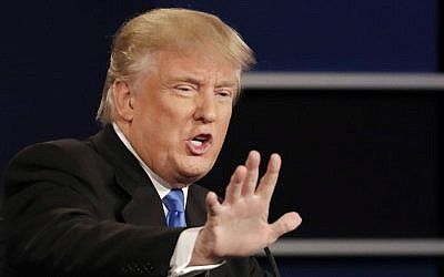 Republican presidential nominee Donald Trump answers a question during the presidential debate with Democratic presidential nominee Hillary Clinton at Hofstra University in Hempstead, New York, Monday, September 26, 2016. (AP/David Goldman)
