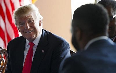 Republican presidential candidate Donald Trump meets with African-American business and civic leaders during a roundtable, Friday, Sept. 2, 2016, in Philadelphia. (AP Photo/Evan Vucci)