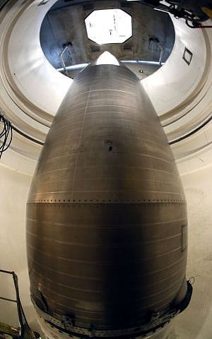 The warhead-containing nose cone of an inert Minuteman 3 missile, in a training launch tube at Minot Air Force Base, N.D., June 25, 2014 (AP Photo/Charlie Riedel. File)
