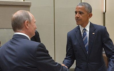 Russian President Vladimir Putin and US President Barack Obama shake hands at the G20 summit being held in Hangzhou in eastern China's Zhejiang province, September 5, 2016. (Alexei Druzhinin, Sputnik, Kremlin Pool Photo via AP)