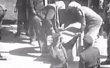 Screenshot from footage showing Israeli spy Eli Cohen placed in a coffin after his execution by hanging in Damascus, Syria on May 18, 1965.