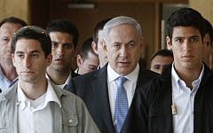 Illustrative: Prime Minister Benjamin Netanyahu flanked by security guards (Miriam Alster/Flash90)