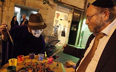 Illustrative. An ultra-Orthodox man gets in touch with his inner artist during the annual 'Manofim' art festival in Jerusalem. (Photo by Miriam Alster/Flash90)