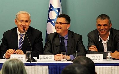 f120108ff90 Prime Minister Benjamin Netanyahu with then-Likud ministers Moshe Kahlon and Gidon Sa'ar, January 8, 2012. (Flash90)