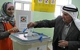Illustrative: A Palestinian man casts his vote in the municipal elections in the West Bank town of Al-Bireh on October 20, 2012. (Issam Rimawi/Flash90)