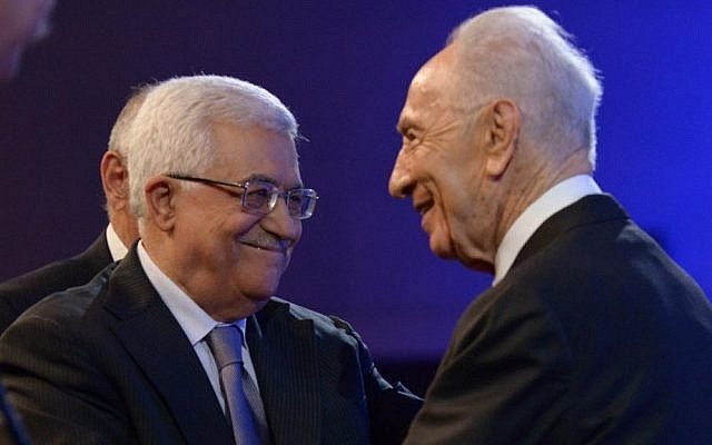 Then-president Shimon Peres, left, meets with Palestinian Authority President Mahmoud Abbas at the World Economic Forum in Amman, Jordan on May 26, 2013. Mark Neyman/GPO/FLASH90)