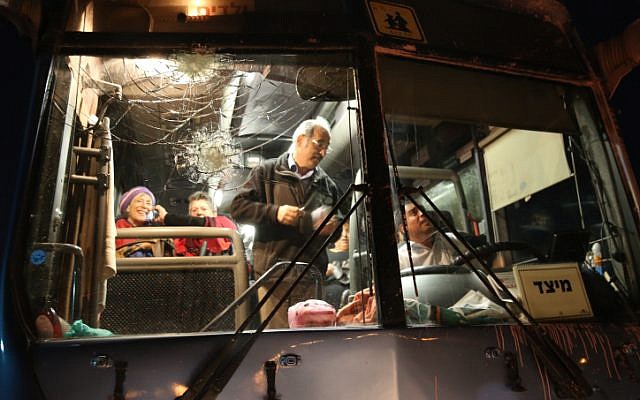 Illustrative. A bus was hit by rocks in the Etzion Bloc in the West Bank on September 10, 2014. (Gershon Elinson/Flash90/File)