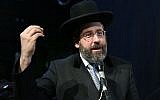 Israel's Ashkenazi Chief Rabbi David Lau attends a conference in memory of late Yemenite rabbi Yihya Yitzhak Halevi in Petah Tikva on June 15, 2016. (Yaakov Cohen/Flash90)