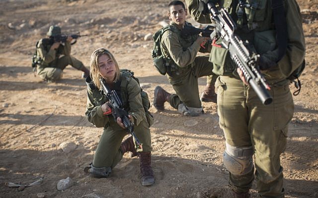 Soldiers of the Bardales Battalion train in urban warfare on an early morning, near Nitzanim in the Arava area of routhern Israel, on July 13, 2016. (Hadas Parush/Flash90)