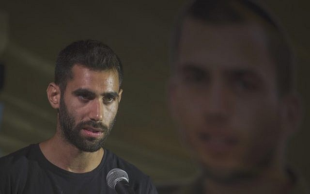 Aviram Shaul, the brother of fallen soldier Oron Shaul, speaks at a rally marking two years since his sibling's body was seized by Hamas, at a protest tent outside Prime Minister Benjamin Netanyahu's residence in Jerusalem, July 20, 2016. (Hadas Parush/Flash90) Aviram Shaul, the brother of fallen soldier Oron Shaul, speaks at a rally marking two years since his sibling's body was seized by Hamas, at a protest tent outside Prime Minister Benjamin Netanyahu's residence in Jerusalem, July 20, 2016. (Hadas Parush/Flash90)