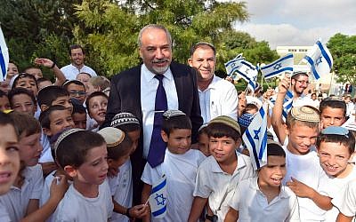 Defense Minister Avigdor Liberman visits Israeli students in the Israeli settlement of Susya, on their first day of school. September 1, 2016. (Ariel Hermoni/Ministry of Defense) Defense Minister Avigdor Liberman visits Israeli students in the Israeli settlement of Susya, on their first day of school. September 1, 2016. (Ariel Hermoni/Ministry of Defense)