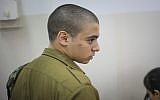 IDF soldier Elor Azaria, the Israeli soldier who shot a disarmed Palestinian terrorist in Hebron in March, at a court hearing at a military court in Jaffa, September 11, 2016. (Flash90)