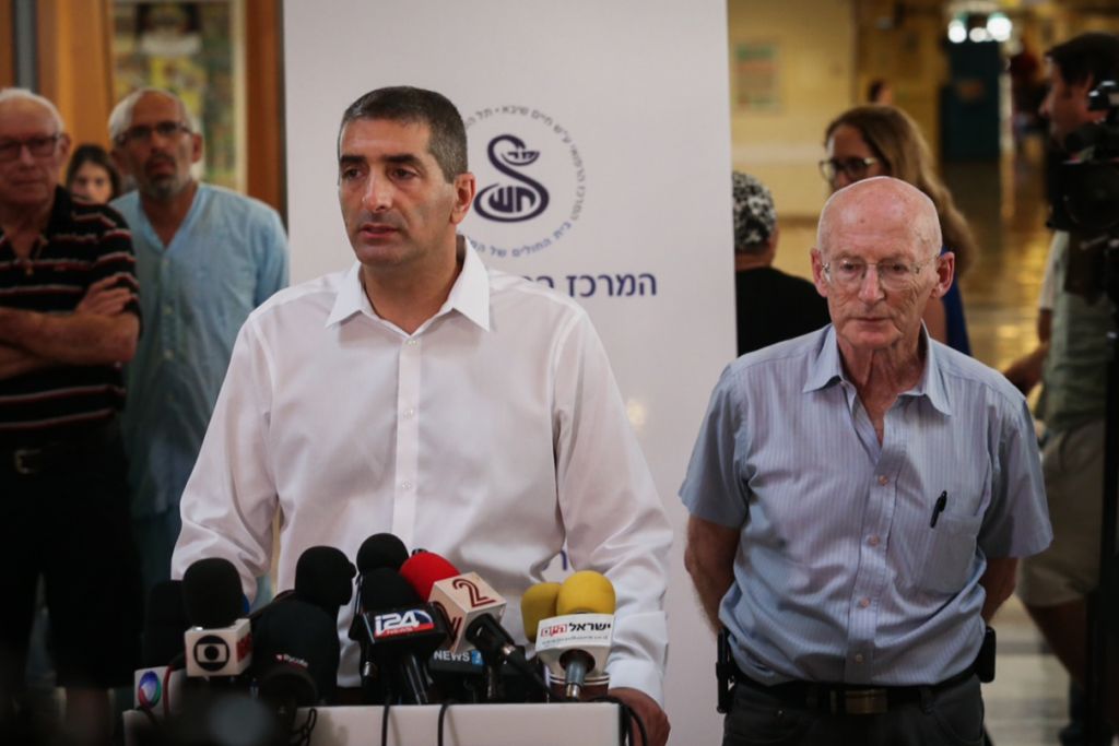 Head of the Sheba Medical Center, Itzhak Krais, and Professor Raphy Walden, son-in -law and personal physician of former Israeli president Shimon Peres, speak with media at the hospital on September 14, 2016. (Miriam Alster/Flash90) Head of the Sheba Medical Center, Itzhak Krais, and Professor Raphy Walden, son-in -law and personal physician of former Israeli president Shimon Peres, speak with media at the hospital on September 14, 2016. (Miriam Alster/Flash90)