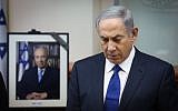 Prime Minister Benjamin Netanyahu in a moment of silence for Shimon Peres during a special cabinet session in Jerusalem, on September 28, 2016 (Marc Israel Sellem/POOL)
