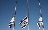 Flags at the Knesset fly at half mast in honor of former president and prime minister Shimon Peres as his body lies in state at the Knesset, September 29, 2016. (Yizhak Harari/Knesset Spokesman's office)