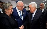 President Reuven Rivlin and his wife Nechama meet Palestinian Authority President Mahmoud Abbas during the State funeral for late former President Shimo Peres at Mount Herzl Cemetery in Jerusalem, on September 30, 2016. (Mark Neyman/GPO)