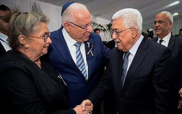 President Reuven Rivlin and his wife Nechama meet Palestinian Authority President Mahmoud Abbas during the State funeral for late former President Shimo Peres at Mount Herzl Cemetery in Jerusalem, on September 30, 2016. (Mark Neyman/GPO) President Reuven Rivlin and his wife Nechama meet Palestinian Authority President Mahmoud Abbas during the State funeral for late former President Shimo Peres at Mount Herzl Cemetery in Jerusalem, on September 30, 2016. (Mark Neyman/GPO)