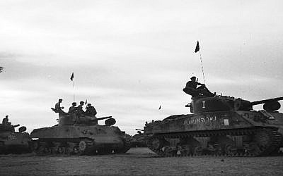 Israeli Sherman tanks advance toward the Mitla Pass during the 1956 Sinai Campaign. (Israel Defense Forces/Flickr) Israeli Sherman tanks advance toward the Mitla Pass during the 1956 Sinai Campaign. (Israel Defense Forces/Flickr)