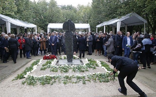 A man places flowers at the monument after a ceremony for victims of terrorism in Paris, Monday Sept.19, 2016. (AP Photo/Michel Euler, Pool) A man places flowers at the monument after a ceremony for victims of terrorism in Paris, Monday Sept.19, 2016. (AP Photo/Michel Euler, Pool)