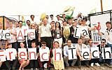 Participants of French hackathon at DLD Tel Aviv with entrepreneur Yossi Vardi, center. (Courtesy Aviv Hoffi).