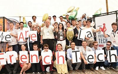 Participants of French hackathon at DLD Tel Aviv with entrepreneur Yossi Vardi, center. (Courtesy Aviv Hoffi).