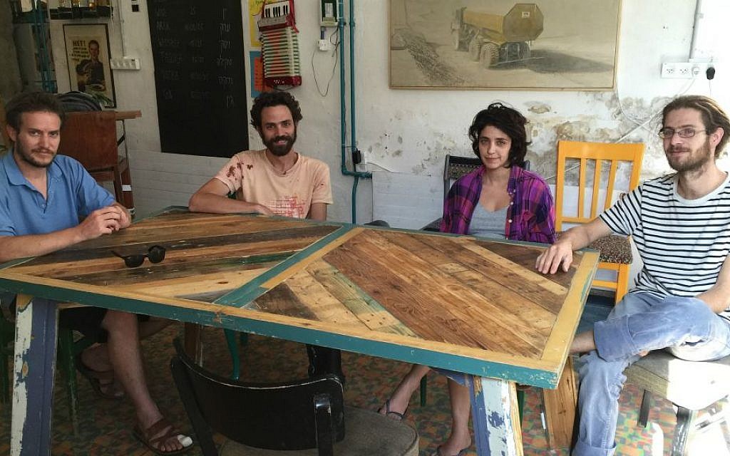 Four of the artists of Empty House, Neta Meisel (left),  Tal Benhamo, Shavit Yaron and Itamar Hammerman, who created HaMiffal, or The Factory, a space for culture and art in Jerusalem (Jessica Steinberg/Times of Israel)