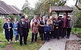 Residents of Vishnyeva gather outside Shimon Peres’s childhood home to pay their respects on the day of his death, September 28, 2016. (Courtesy of Limmud FSU)