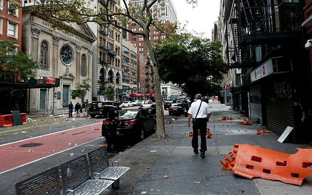 A view of the street Sunday, Sept. 18, 2016, at the site of an explosion that occurred on Saturday night in the Chelsea neighborhood of New York City. (Justin Lane/EPA via AP, Pool)