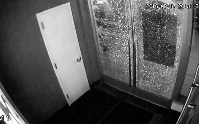 A door shatters after an explosion in the Chelsea neighborhood of New York, September 17, 2016. (Orangetheory Fitness Chelsea via AP)