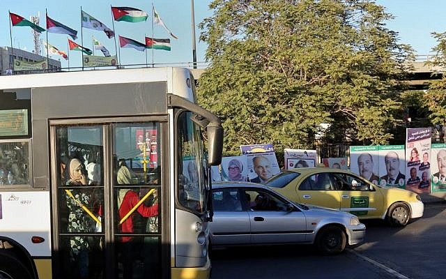 Election posters are on display in the capital, Amman, Jordan, Sunday, Sept. 18, 2016. (AP Photo/Raad Adayleh) 