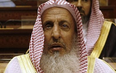 In this Tuesday, March 24, 2009 file photo, Sheikh Abdul Aziz al-Sheikh, the Saudi grand mufti listens to a speech of King Abdullah of Saudi Arabia at the Consultative Council in Riyadh, Saudi Arabia. (AP Photo/Hassan Ammar, File)