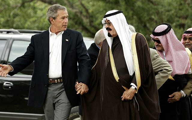 In this April 25, 2005 file photo, President George W. Bush greets Saudi Crown Prince Abdullah at the former's ranch in Crawford, Texas. (AP Photo/Gerald Herbert, File)