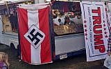 A Nazi flag displayed for purchase on a merchandise vendor's trailer at the Bloomsburg Fair fairgrounds in Bloomsburg, Pennsylvania, September 24, 2016,  (Edward Conner via AP)