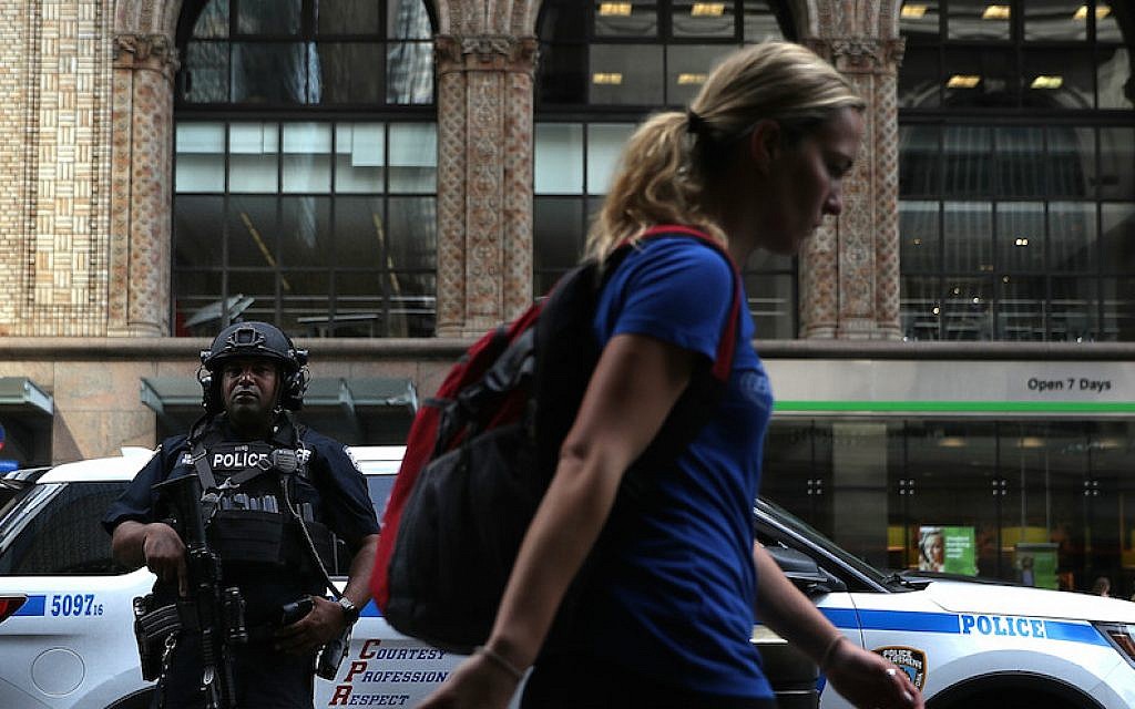 A New York City police officer standing guard outside Grand Central Station in New York City, Sept. 20, 2016. (Justin Sullivan/Getty Images via JTA) A New York City police officer standing guard outside Grand Central Station in New York City, Sept. 20, 2016. (Justin Sullivan/Getty Images via JTA)