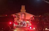 Firefighters work at the scene of a fire at the Islamic Center of Fort Pierce on Monday, September 12, 2016, in Fort Pierce, Florida (St. Lucie Sheriff's Office via AP)