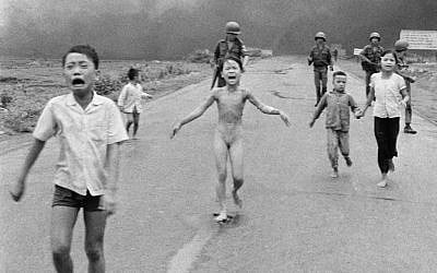 This is a June 8, 1972 file photo of South Vietnamese forces follow after terrified children, including 9-year-old Kim Phuc, center, as they run down Route 1 near Trang Bang after an aerial napalm attack on suspected Viet Cong hiding places . Norway's Prime Minister Erna Solberg ﻿on Friday Sept. 9, 2016 challenged Facebook’s restrictions on nude photos by posting an iconic 1972 image of a naked girl running from an aerial napalm attack in Vietnam. The Pulitzer Prize-winning image by Associated Press photographer Nick Ut is at the center of a heated debate about freedom of speech in Norway after Facebook deleted it from a Norwegian author’s page last month. (AP Photo/Nick Ut, File)