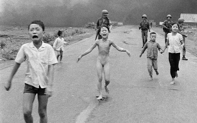 This is a June 8, 1972 file photo of South Vietnamese forces follow after terrified children, including 9-year-old Kim Phuc, center, as they run down Route 1 near Trang Bang after an aerial napalm attack on suspected Viet Cong hiding places . Norway's Prime Minister Erna Solberg on Friday Sept. 9, 2016 challenged Facebook’s restrictions on nude photos by posting an iconic 1972 image of a naked girl running from an aerial napalm attack in Vietnam. The Pulitzer Prize-winning image by Associated Press photographer Nick Ut is at the center of a heated debate about freedom of speech in Norway after Facebook deleted it from a Norwegian author’s page last month. (AP Photo/Nick Ut, File) This is a June 8, 1972 file photo of South Vietnamese forces follow after terrified children, including 9-year-old Kim Phuc, center, as they run down Route 1 near Trang Bang after an aerial napalm attack on suspected Viet Cong hiding places . Norway's Prime Minister Erna Solberg on Friday Sept. 9, 2016 challenged Facebook’s restrictions on nude photos by posting an iconic 1972 image of a naked girl running from an aerial napalm attack in Vietnam. The Pulitzer Prize-winning image by Associated Press photographer Nick Ut is at the center of a heated debate about freedom of speech in Norway after Facebook deleted it from a Norwegian author’s page last month. (AP Photo/Nick Ut, File)