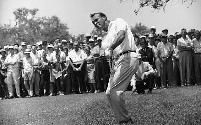 Arnold Palmer, lifting an iron shot from No. 5 fairway in the final round of the Texas Open in San Antonio, April 29, 1962. (AP/Ted Powers)