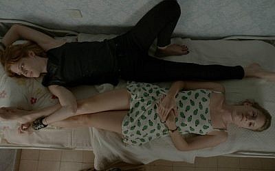 Yuval Scharf (top) and Yaara Pelzig play estranged sisters who reunite in "Moon in the 12th House" (Ran Mendelson/United King)