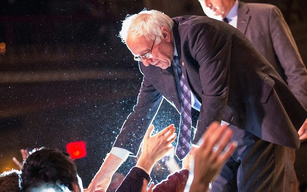 Bernie Sanders, I-Vt., shaking hands with supporters after outlining his plan to reform the US financial sector in New York City, Jan. 15, 2016. (Andrew Burton/Getty Images) Bernie Sanders, I-Vt., shaking hands with supporters after outlining his plan to reform the US financial sector in New York City, Jan. 15, 2016. (Andrew Burton/Getty Images)