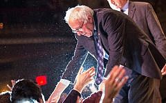 Bernie Sanders, I-Vt., shaking hands with supporters after outlining his plan to reform the US financial sector in New York City, Jan. 15, 2016. (Andrew Burton/Getty Images)