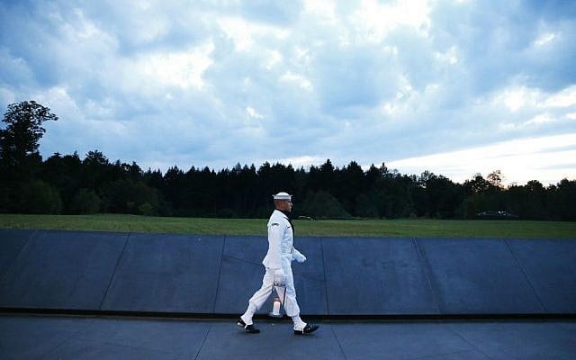 Candles in memory of the passengers and crew of Flight 93, are carried to the Wall of Names at the Flight 93 National Memorial in Shanksville, Pennsylvania, Saturday, Sept. 10, 2016, as the nation marks the 15th anniversary of the Sept. 11 attacks. (AP Photo/Jared Wickerham) Candles in memory of the passengers and crew of Flight 93, are carried to the Wall of Names at the Flight 93 National Memorial in Shanksville, Pennsylvania, Saturday, Sept. 10, 2016, as the nation marks the 15th anniversary of the Sept. 11 attacks. (AP Photo/Jared Wickerham)