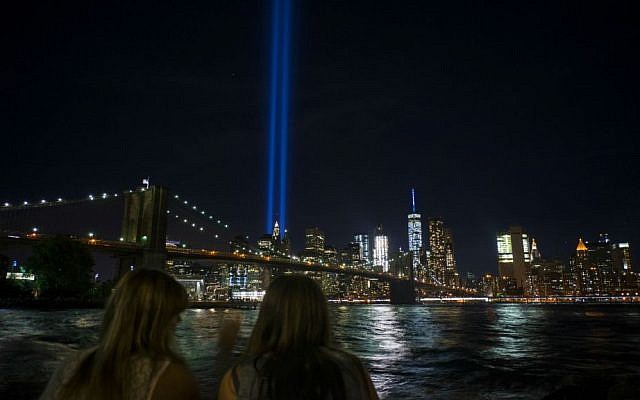 The Tribute in Light, viewed from the Brooklyn borough of New York, rises above the lower Manhattan skyline, Sunday, Sept. 11, 2016, in New York, the fifteenth anniversary of the terrorist attacks of Sept. 11, 2001. (AP Photo/Craig Ruttle) The Tribute in Light, viewed from the Brooklyn borough of New York, rises above the lower Manhattan skyline, Sunday, Sept. 11, 2016, in New York, the fifteenth anniversary of the terrorist attacks of Sept. 11, 2001. (AP Photo/Craig Ruttle)