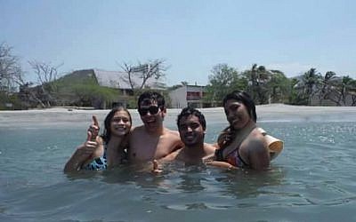 Shirat Hayam congregants in the 'Playa Mikveh' in Santa Marta. (Courtesy)